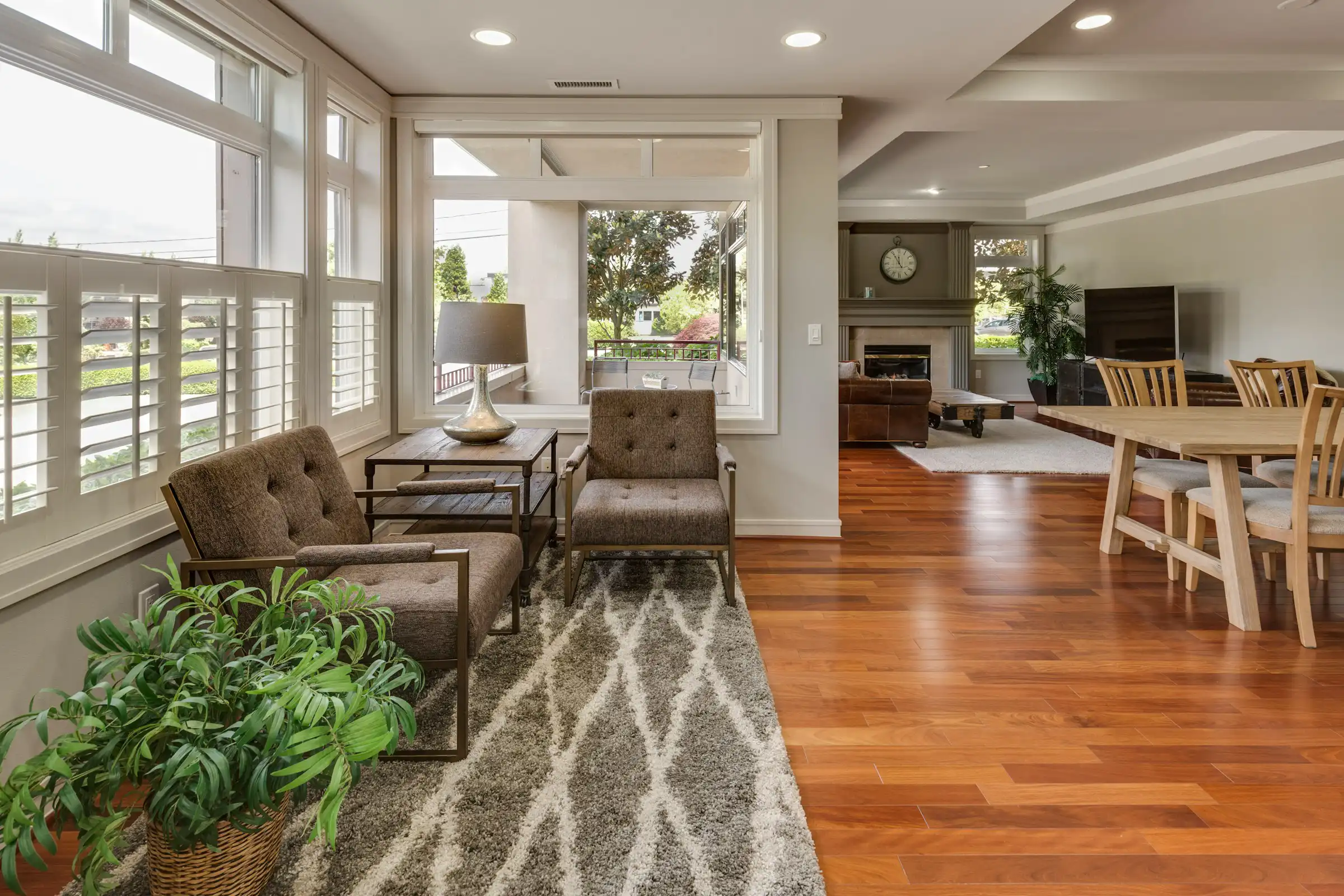Contemporary living room with neutral tones and clean layout
