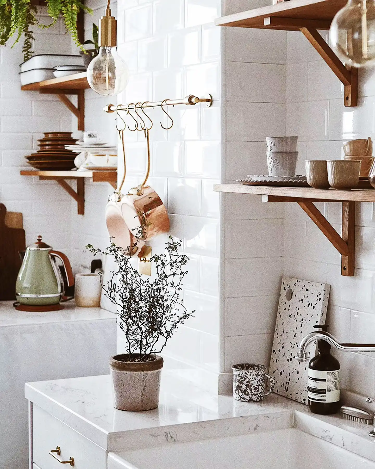 Stylish kitchen featuring wooden cabinets and bright lighting