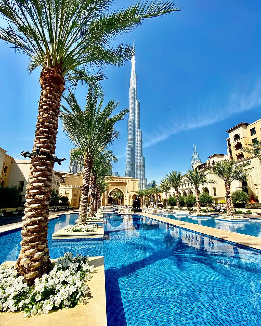 Dubai city scene featuring contemporary buildings and busy streets